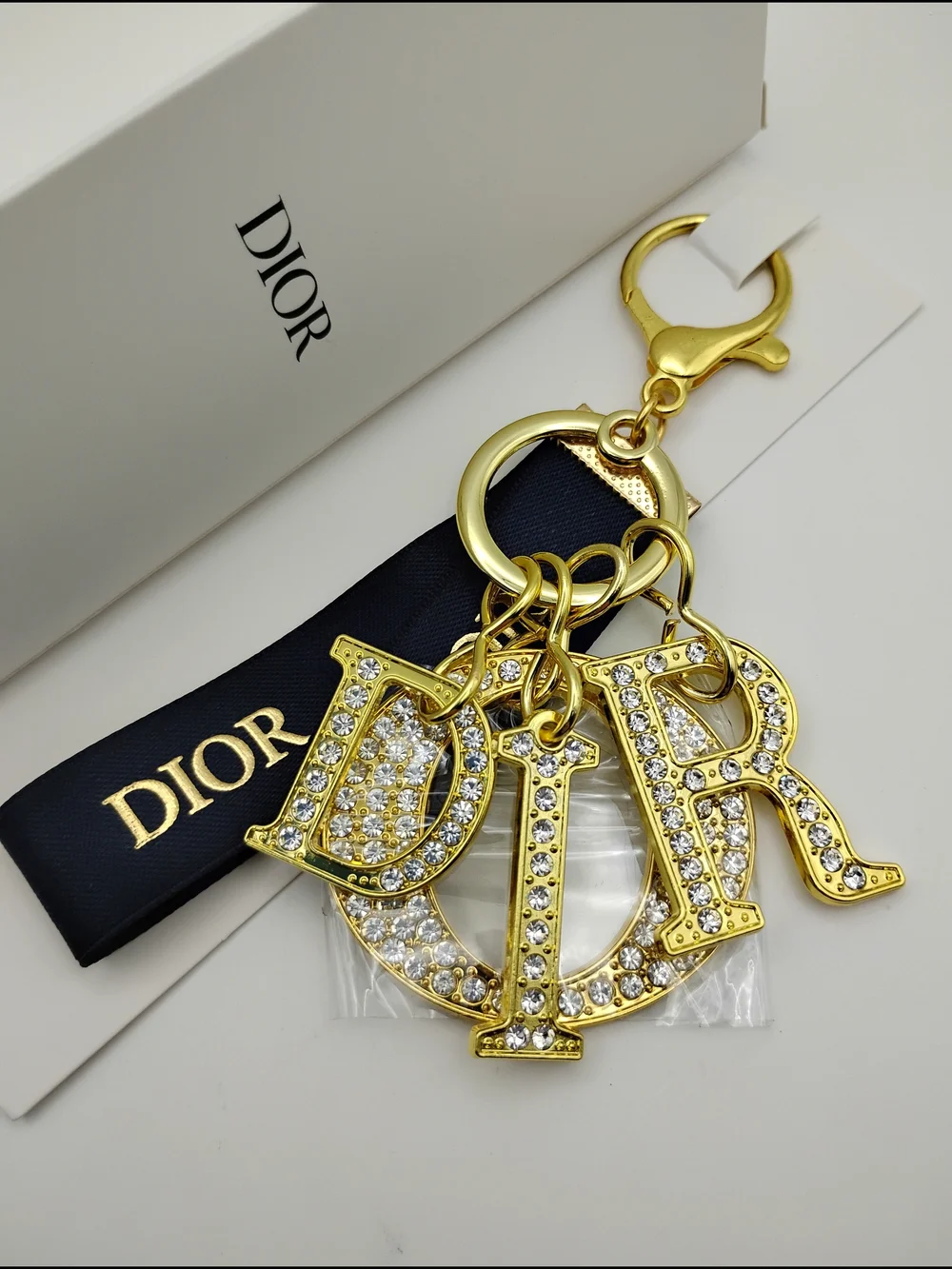 Dior Gold Crystal 'D I O R' Logo Keychain with Black Ribbon BNIB